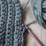 Crochet stitch with pink hook - dreamstime_l_8743636